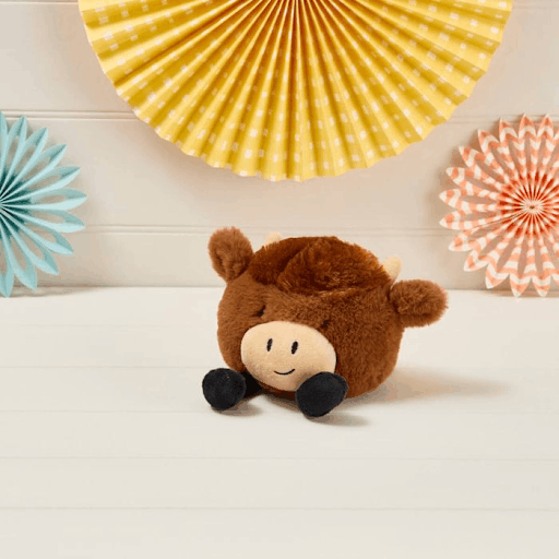 A brown highland cow cuddly toy which is a 2026 trend and a must-have plush.